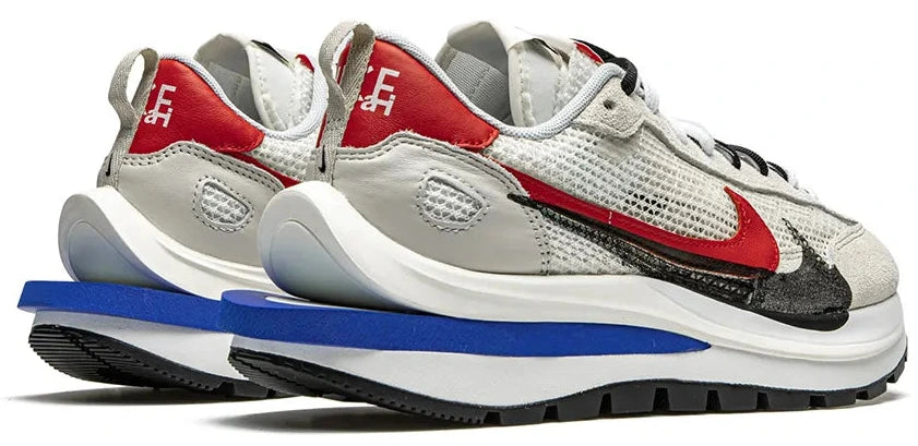 Nike VaporWaffle x sacai “Sport Fuchsia Game Royal”