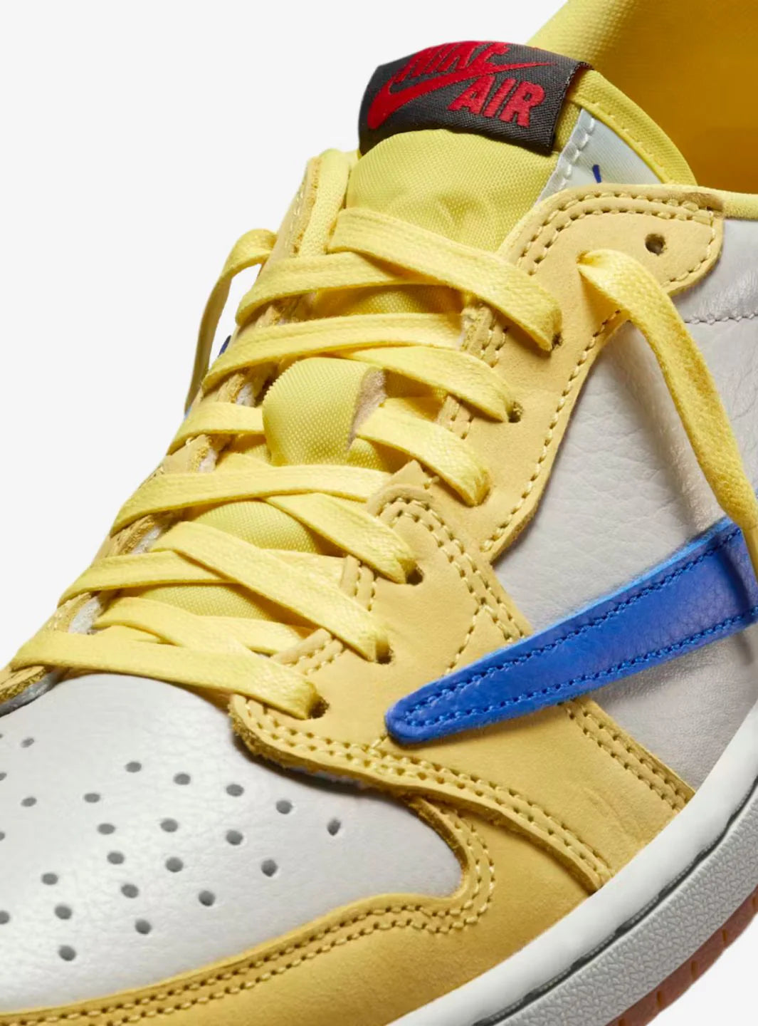 JORDAN 1 LOW x TRAVIS SCOTT “CANARY YELLOW” (WMNS)