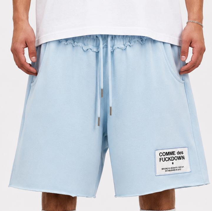 COMME DES FUCKDOWN SKY BLUE SHORTS