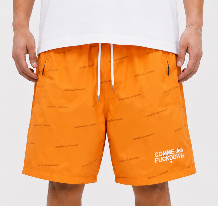 COMME DES FUCKDOWN Orange Logo Swim Shorts