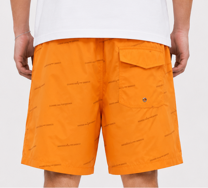 COMME DES FUCKDOWN Orange Logo Swim Shorts